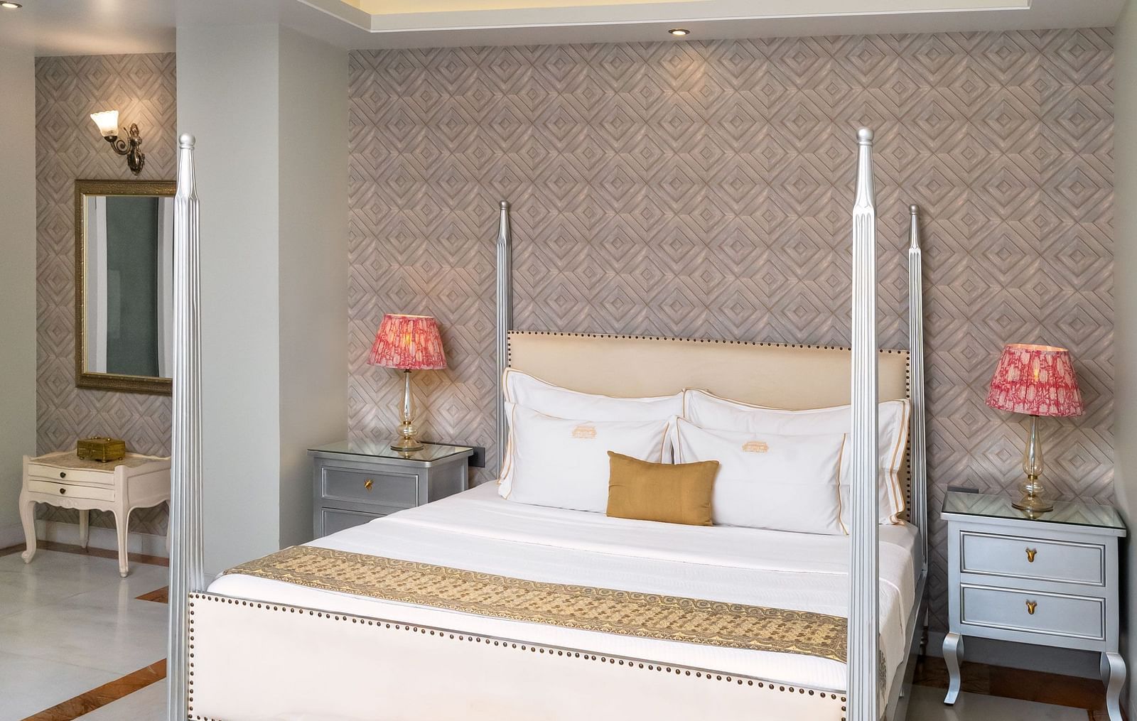 A room at Dileep Kothi, Jaipur with a double bed and side tables